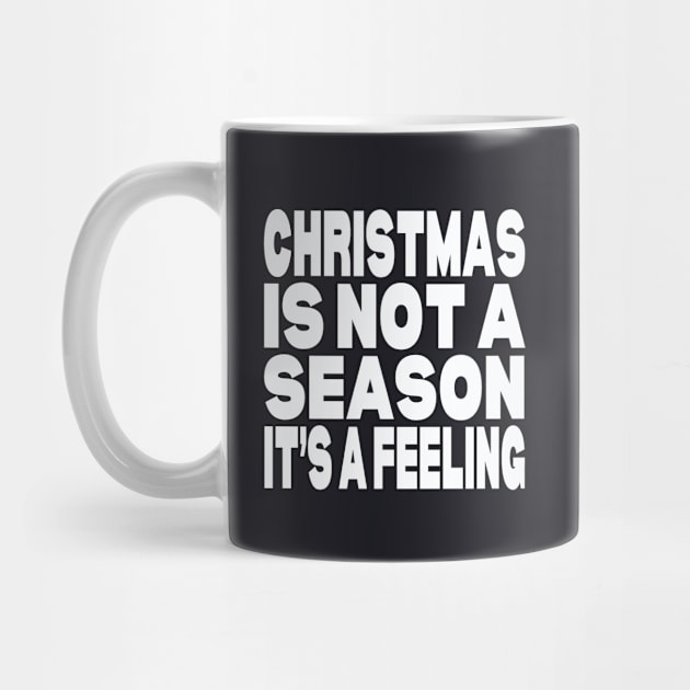 Christmas is not a season it's a feeling by Evergreen Tee